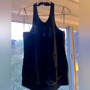 Shimmy your shoulders with this black dressy halter, perfect for the holidays